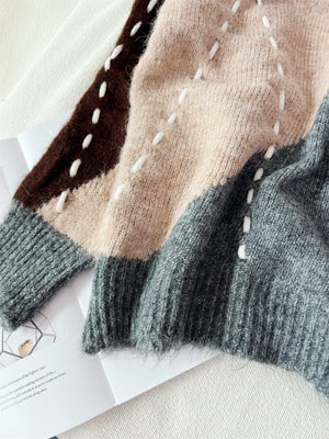 Gray oversized v-neck sweater with v-neck