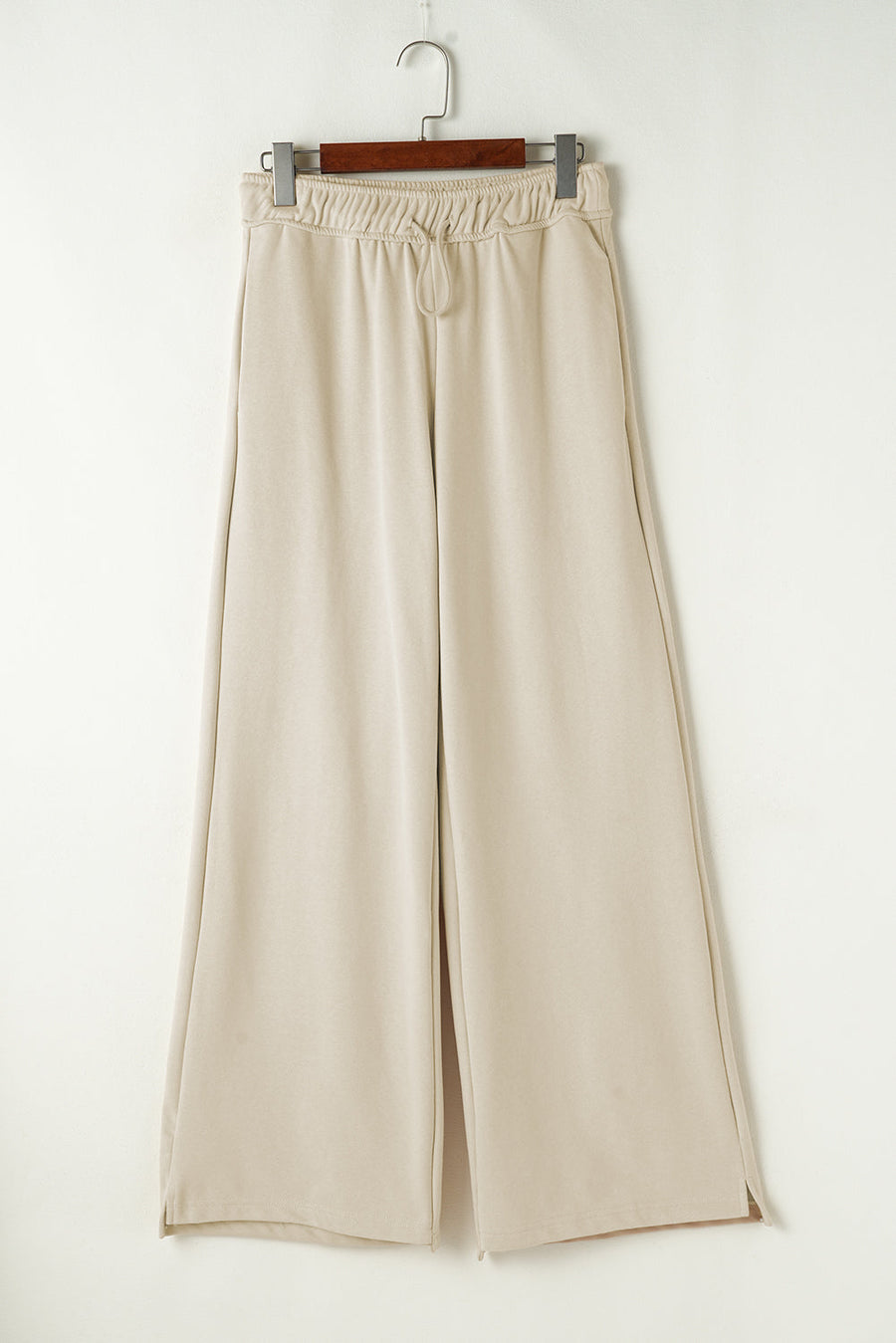 Beige wide-leg drawstring lounge pants with side slits