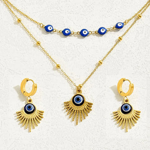 royal blue jewelry set featuring evil eye charm and evil eye motif