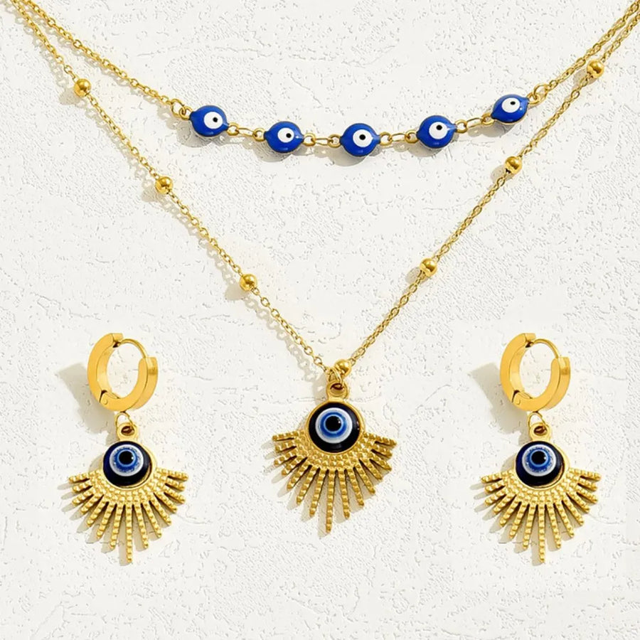 royal blue jewelry set featuring evil eye charm and evil eye motif