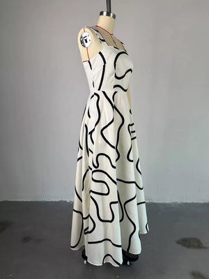 White abstract patterned midi dress with square neckline and sleeveless design.