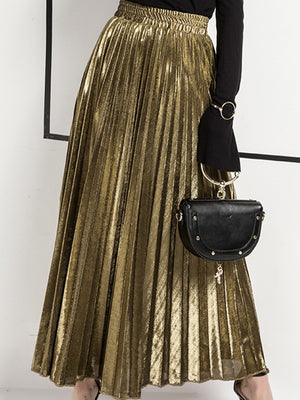 maxi skirt in metallic gold featuring pleated and flared fit