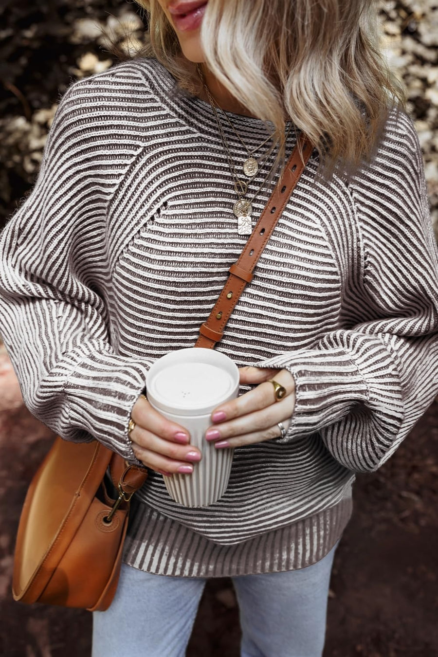 Textured stripe batwing knit sweater in taupe and white with crew neck and relaxed fit.