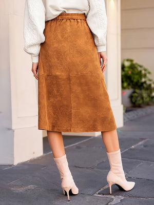 95% polyester, 5% spandex Care instructions: Machine wash cold midi skirt in camel with A-line silhouette