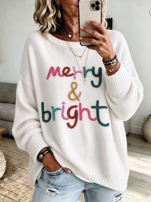 100% polyester Care instructions: Machine wash cold pullover sweater in White with relaxed silhouette
