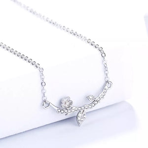clear necklace featuring adjustable length and floral
