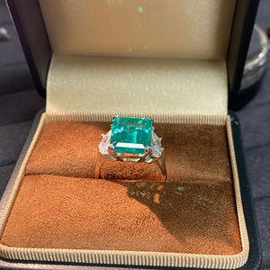 ring in teal with geometric and zircon stones