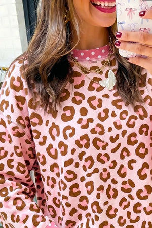 100% polyester Care instructions: Machine wash cold sweatshirt in Leopard with relaxed silhouette