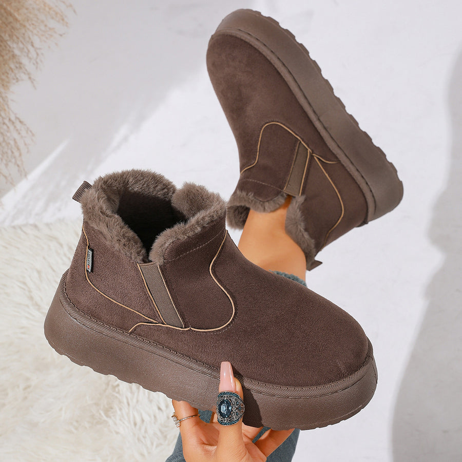 Black boots with ankle-length and slip-on