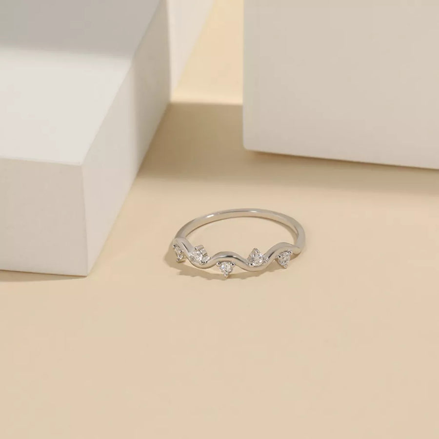 ring in silver with wave and zircon embellishment