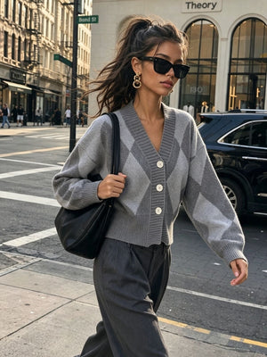 Green cardigan featuring buttoned and argyle