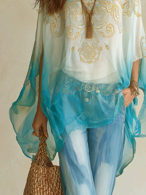 light blue blouse featuring sheer and ornate