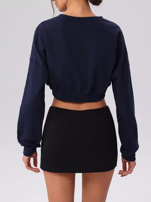 light gray cardigan with cropped and button-front