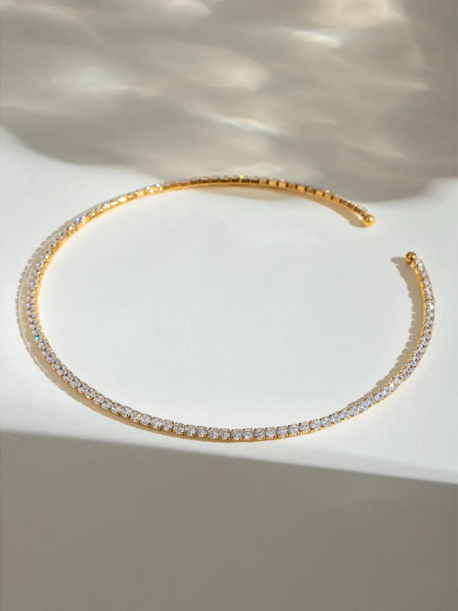 Gold collar necklace with a full row of diamonds