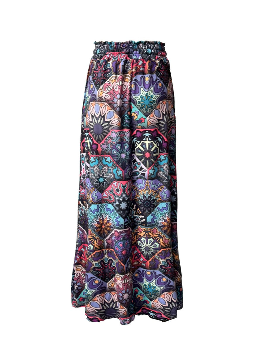 Maxi skirt with multicolor geometric print and ruffled elastic waist.