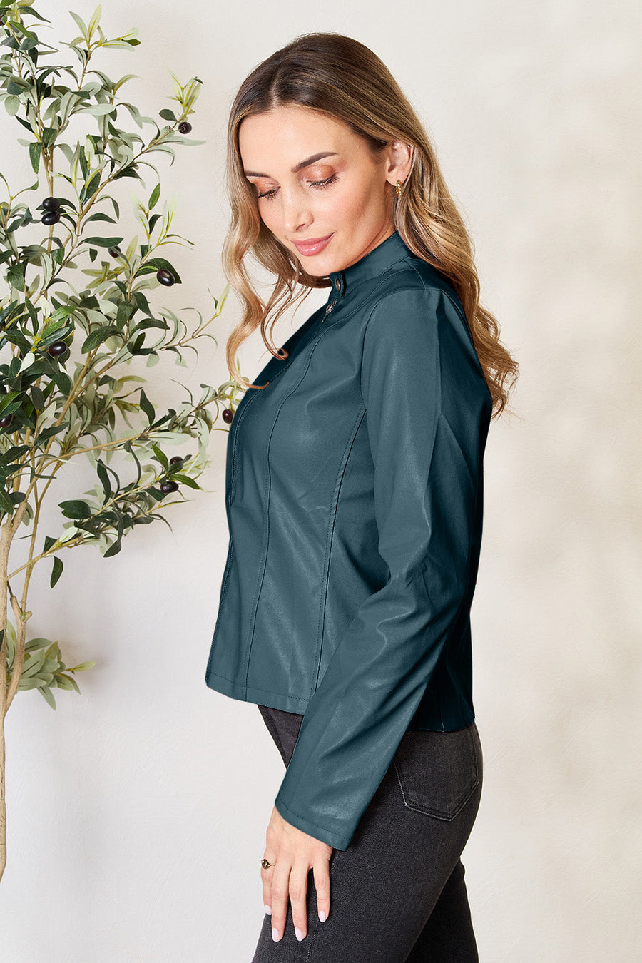 Faux leather biker jacket in Peacock Blue with a stand-up collar and zip front.