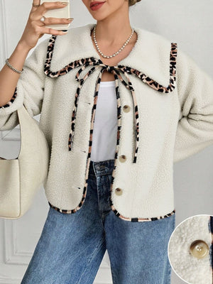 brown jacket featuring tied and leopard-print