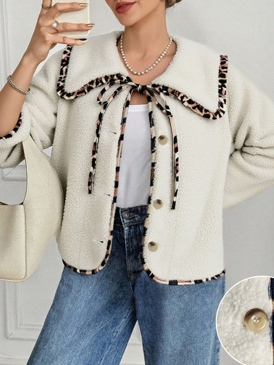 brown jacket featuring tied and leopard-print