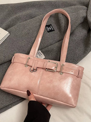 Blush pink shoulder bag with buckle detail and silver hardware