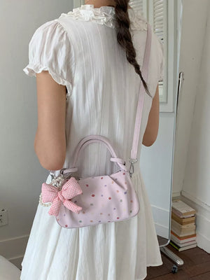 crossbody bag featuring polka dot in Pink with PU Leather Imported Size & texture