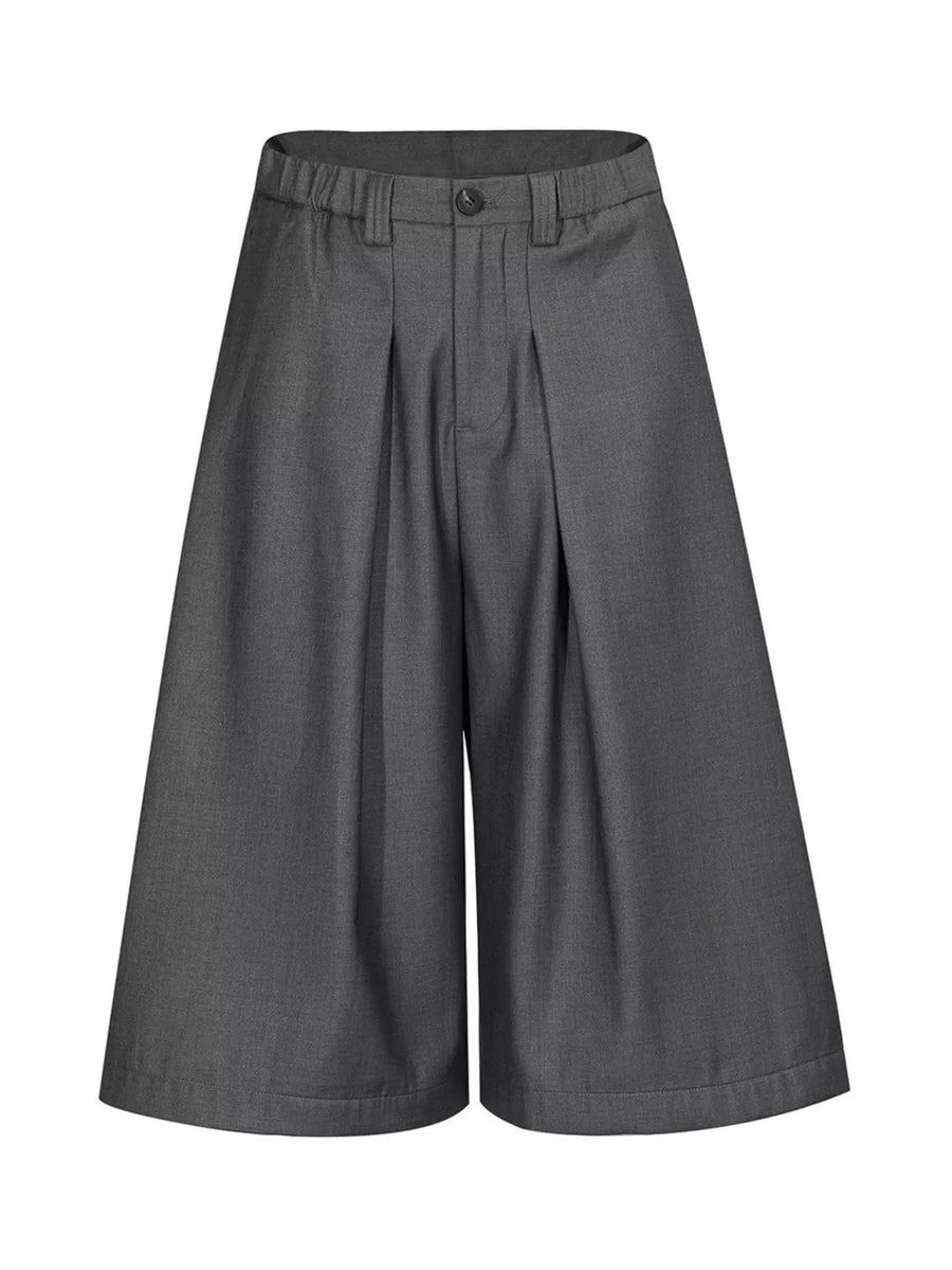 capri pants in charcoal featuring pleated front and wide-leg fit