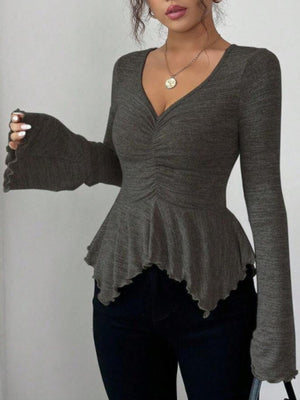 100% polyester Care instructions: Machine wash cold peplum top in Khaki with fitted silhouette