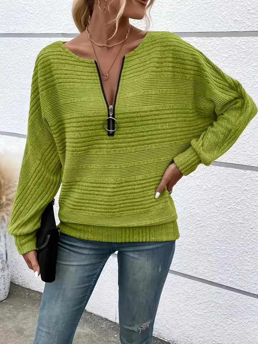 Sage ribbed acrylic sweatshirt with O-ring quarter zip and dolman sleeves.