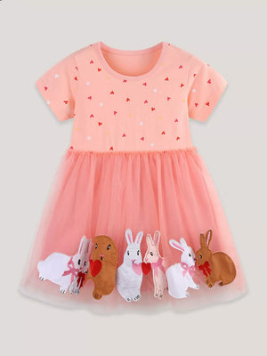 Pink cotton baby dress with heart print and tulle skirt featuring bunny appliques.