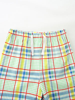 Boys' plaid cotton shorts with elastic waistband and drawstring.