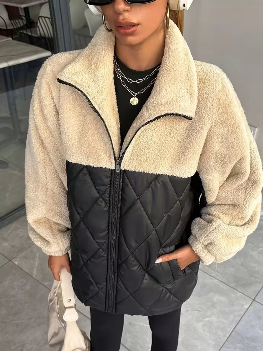 100% polyester Care instructions: Machine wash cold puffer jacket in Black with relaxed silhouette