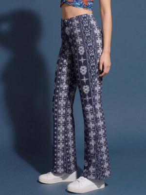 95% polyester, 5% spandex Care instructions: Machine wash cold wide-leg pants in Blue with flared silhouette