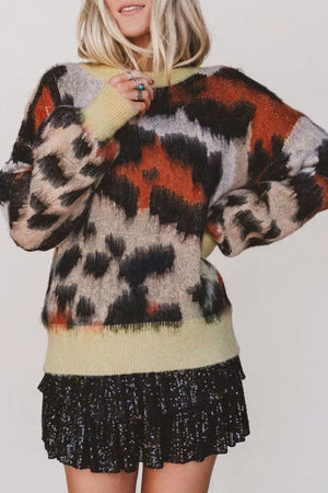 52% viscose, 26% polyester, 22% polyamide Care instructions: Machine wash cold pullover sweater in cream with relaxed
