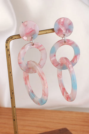 Pink and blue marbled drop earrings with interlocking rings