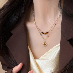Copper, Gold-plated, Tiger' necklace in brown with straight silhouette