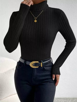Black ribbed turtleneck long sleeve tee with a fitted silhouette.