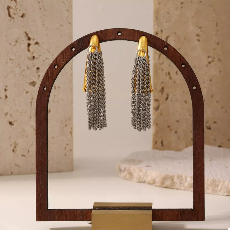 Gold hoop earrings with layered silver chain tassels