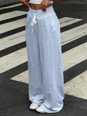 95% polyester, 5% elastane Care instructions: Machine wash cold wide-leg pants in Gray/white with loose silhouette