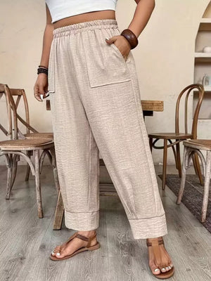 100% polyester Care instructions: Machine wash cold wide-leg pants in Black with loose silhouette