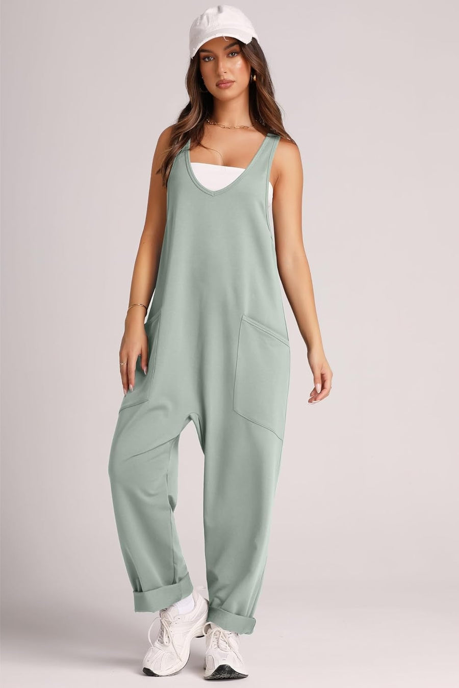 Relaxed fit jumpsuit in Matcha Green with oversized pockets and cuffed hems.