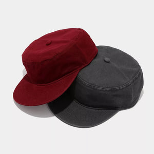 hat in burgundy featuring brim and fitted fit