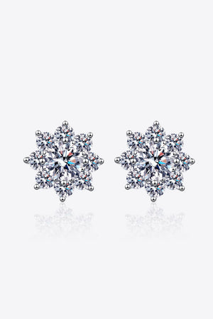 Silver blossom moissanite earrings with sparkling cubic zirconia details.