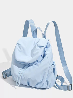 Blue nylon drawstring backpack with flap closure and adjustable straps.