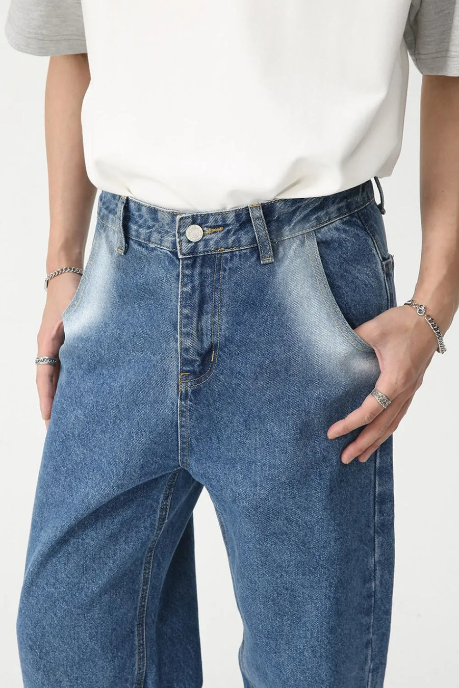 Faded panel wide-leg jeans in medium wash denim with a relaxed fit.