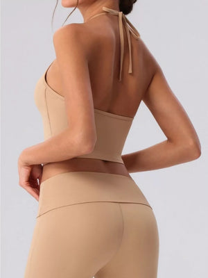 75% nylon, 25% spandex Care instructions: Machine wash cold activewear set in white with flared silhouette
