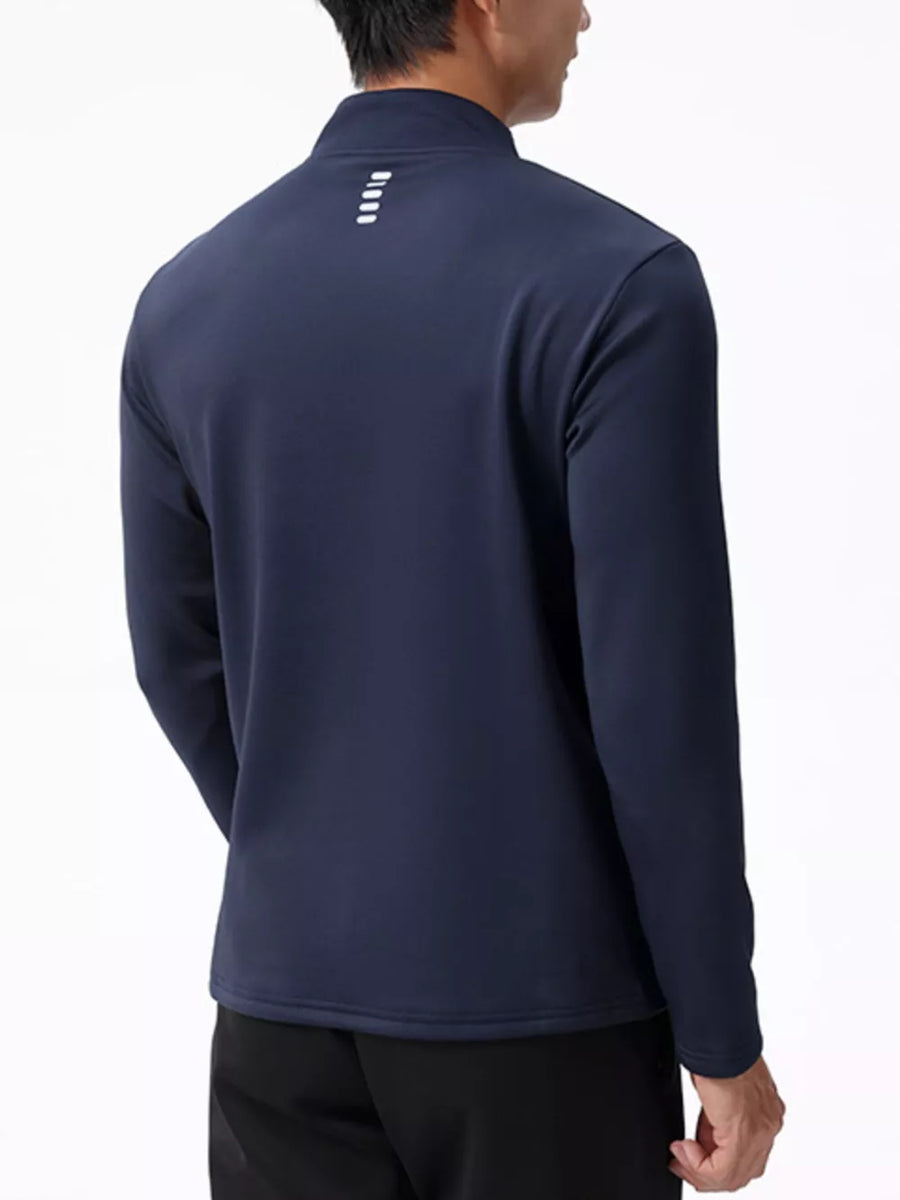 Men's dark navy half-zip sweatshirt with reflective detail on back yoke.
