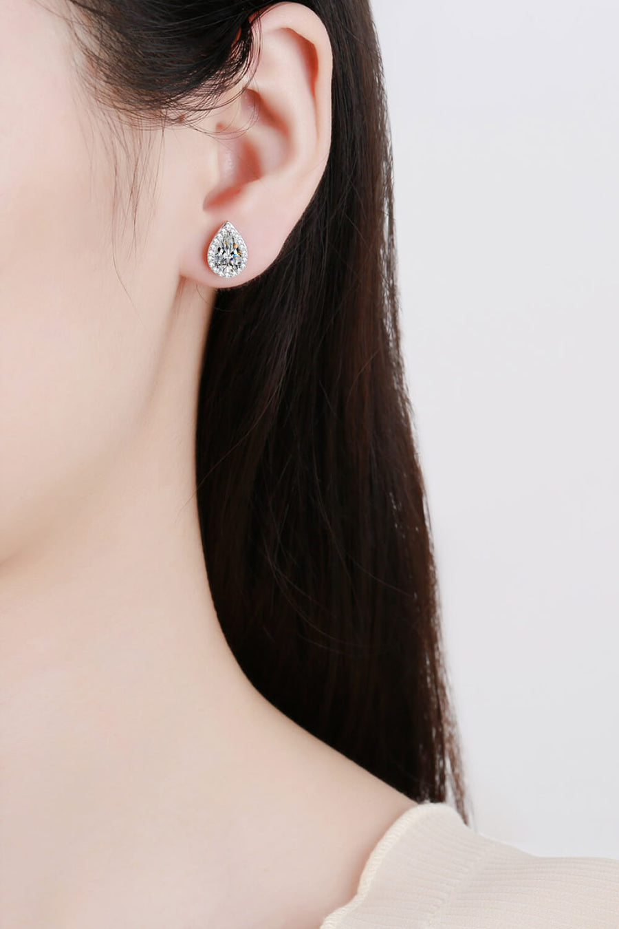 Silver teardrop halo earrings with pavé detail