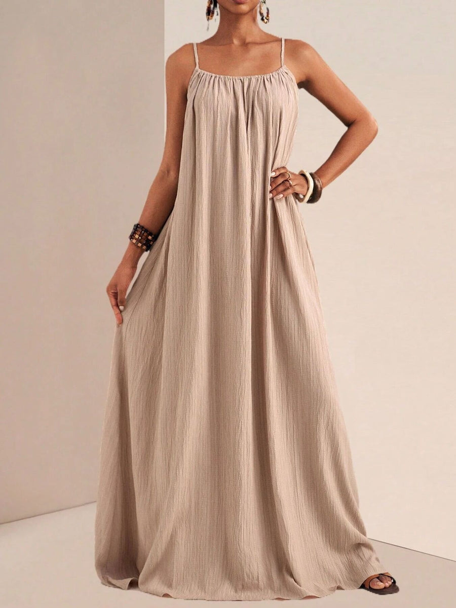 Khaki maxi swim dress with spaghetti straps and gathered neckline.