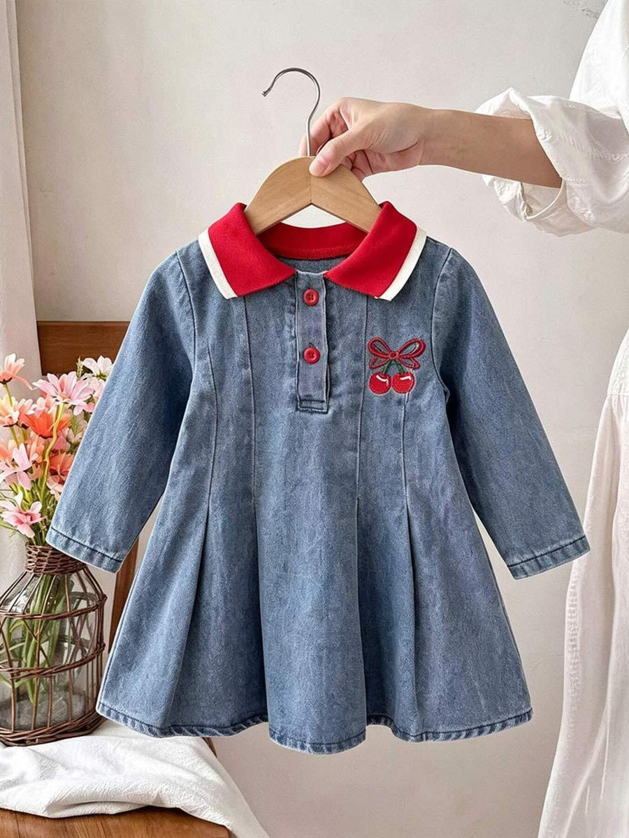red polo dress featuring buttoned and embroidered