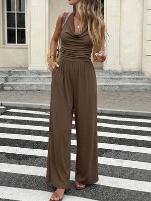 Brown halter neck wide-leg romper with ruched waist and pockets