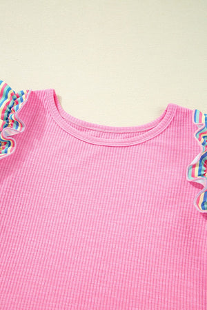 Pink ribbed knit top with pastel stripe ruffle sleeves